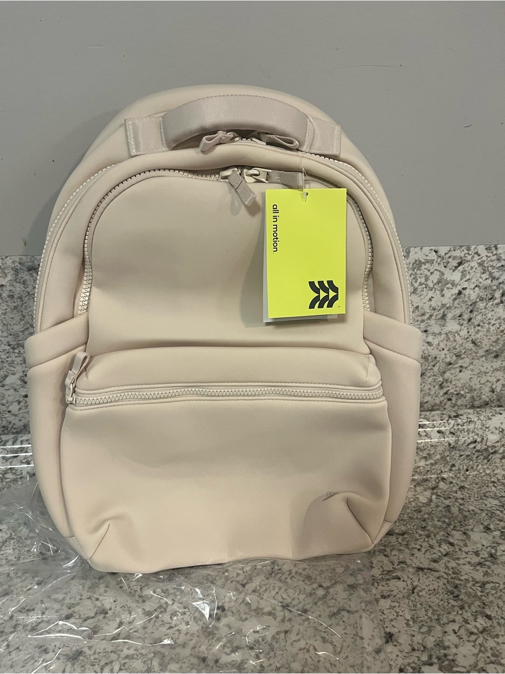 all in motion Cream neoprene Backpack with Front Zip Pocket